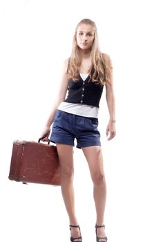 Beautiful girl with a suitcase studio shooting