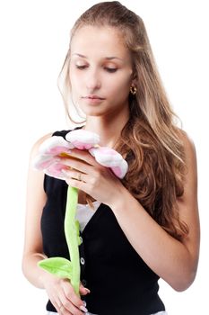 Girl with a toy flower color studio photography