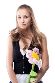 Portrait of a beautiful girl with long hair plush flower studio shooting