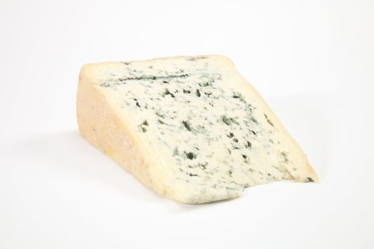 Wedge of full fat soft blue cheese