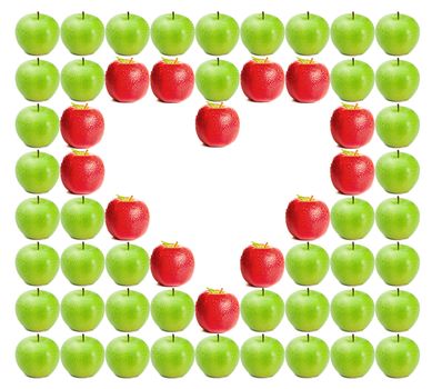 Green wet apples with red apples shaping a heart in between on a white background