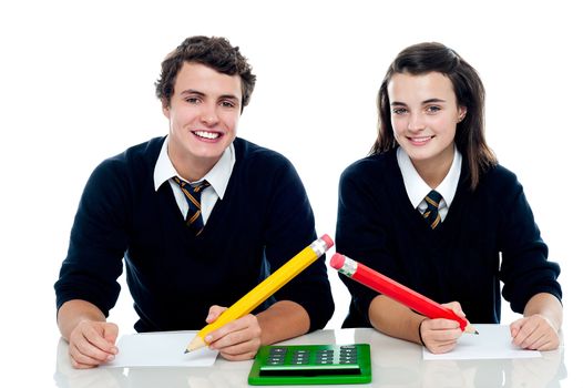 Boy and girl are ready to take up the general knowledge quest