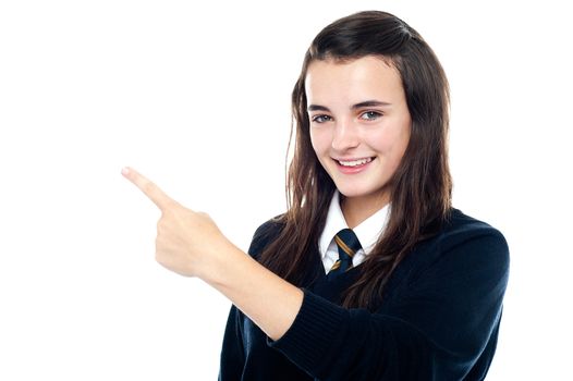 An active young girl showing the direction to the office room