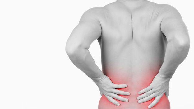 Man showing that he has pain in his back against a white background