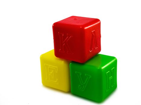 colored cubes for children on a white background