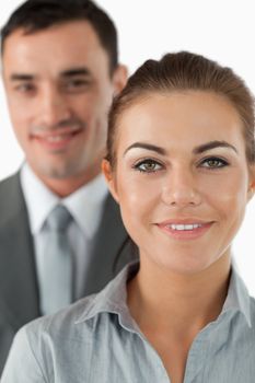 Close up of business partners against a white background