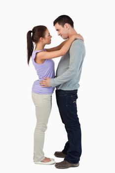 Young couple in love against a white background