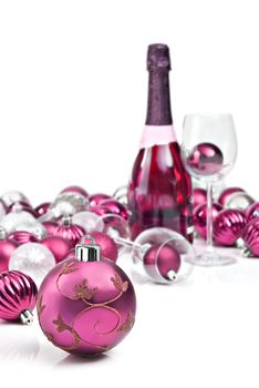 Pink christmas ornaments with wine