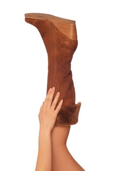 brown leather boots with high heel on the leg
