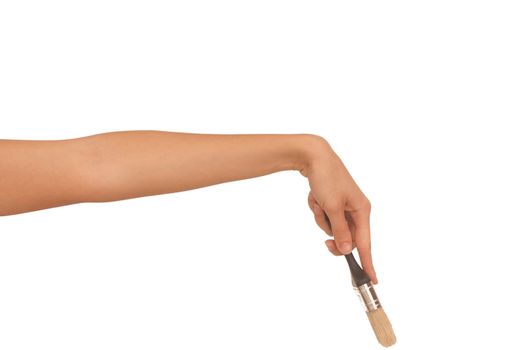 The woman does repair in the house and attends to a walls painting