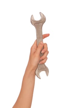 woman holding big spanner in the hands