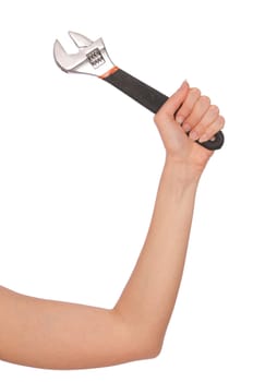 woman holding adjustable spanner in the hand