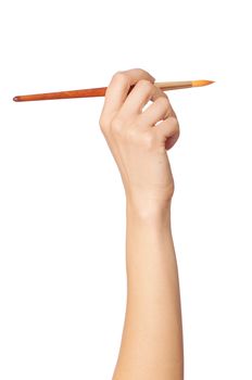 woman paints a picture with a red brush