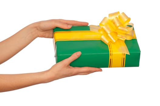 woman giving a green box with yellow bow as a gift