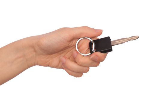 Key from the new house in hands of the woman
