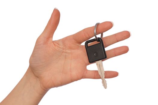 Key from the new house in hands of the woman