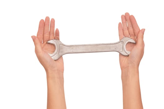 woman holding chrome vanadium spanner in the hands