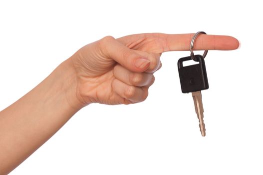Key from the new house in hands of the woman