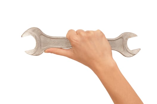 big spanner in the woman's hand on white background