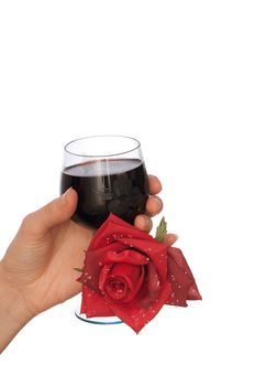 woman take red rose and glass with red wine