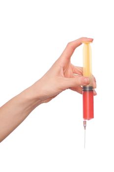 Woman holds in the hand syringe with a new antibiotic mixed with blood
