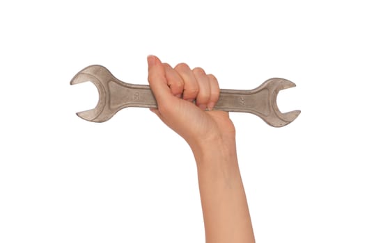 big spanner in the woman's hand on white background