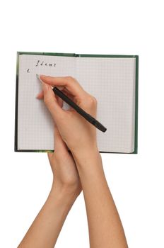 business woman writes ideas for business plan