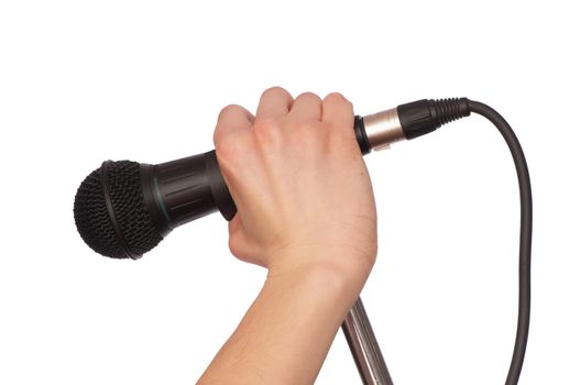 woman holding big black microphone for singing