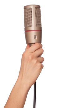 woman holding big condenser microphone for singing