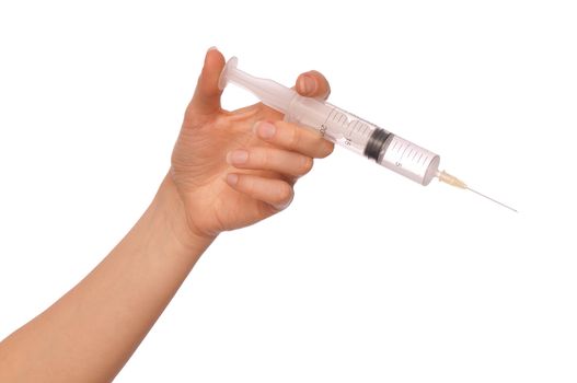 syringe in the woman's hand for making injections