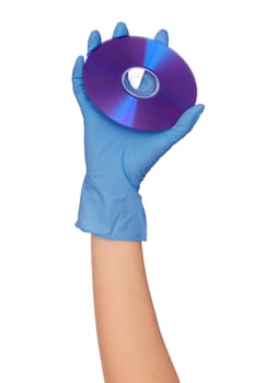 Disk with dangerous confidential audio and video about hacker programs and viruses in a hand of the inspector