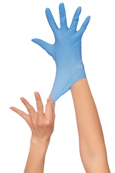 doctor putting on blue sterilized medical glove for making operation