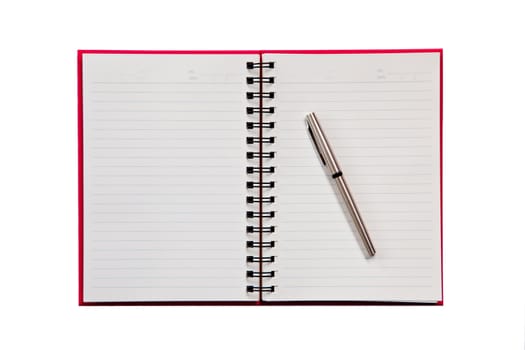 notebook and pen on white background