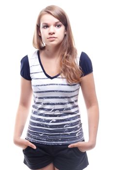 Portrait of a girl in a striped shirt and shorts in studio photography