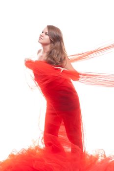 Beautiful girl in a red cloth studio shooting