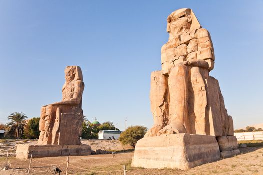 colossi memnon at the theban necropolis, luxor, egypt