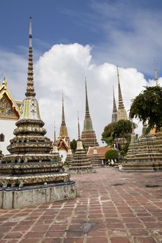 beautiful pagodas in wat pho, bangkok, thailand