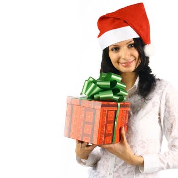 The beautiful young girl with gifts costs and the holiday smiles Christmas new year