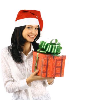 The beautiful young girl with gifts costs and the holiday smiles Christmas new year