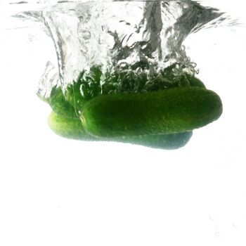 cucumber splash isolated on white background