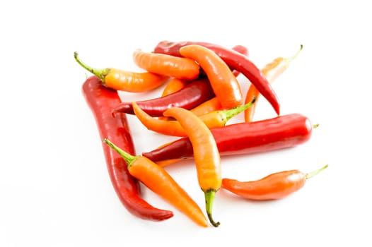 Yellow chili peppers isolated on a white background