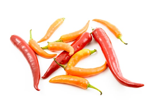 Yellow chili peppers isolated on a white background