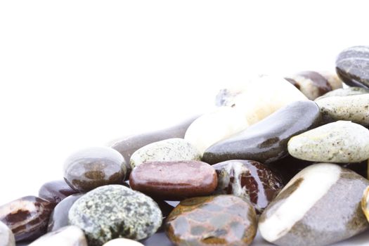Copy space on wet pebble stones natural background.