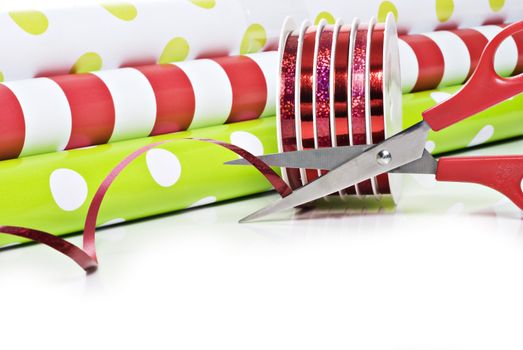 Rolls of gift wrapping paper and rolls of ribbon