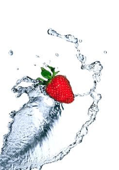 Red strawberry inside flowing water on white background