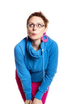 Young woman makes funny face. Isolated on white. Studio shot.
