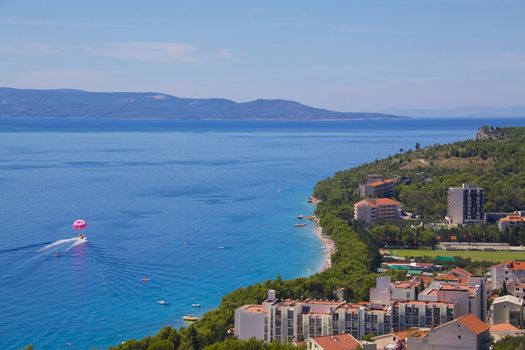 Bird's eye view of popular holiday resort Tucepi by Adriatic Sea on Makarska Riviera, Dalmatia, Croatia