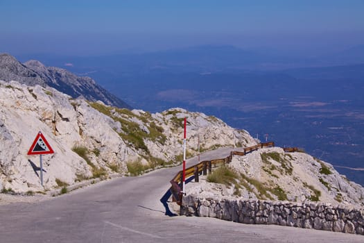 Road across picturesque nature park Biokovo on Dalmatian coast near Makarska Riviera in Croatia