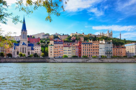 Lyon cityscape from Saone river with colorful houses and river, France