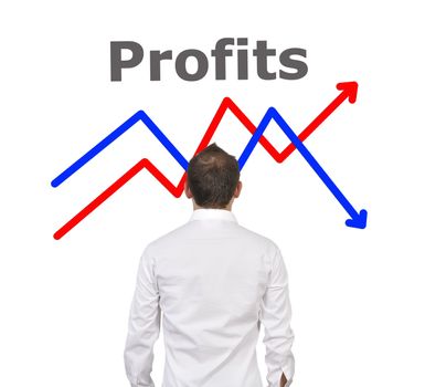 businessman looks at growth chart